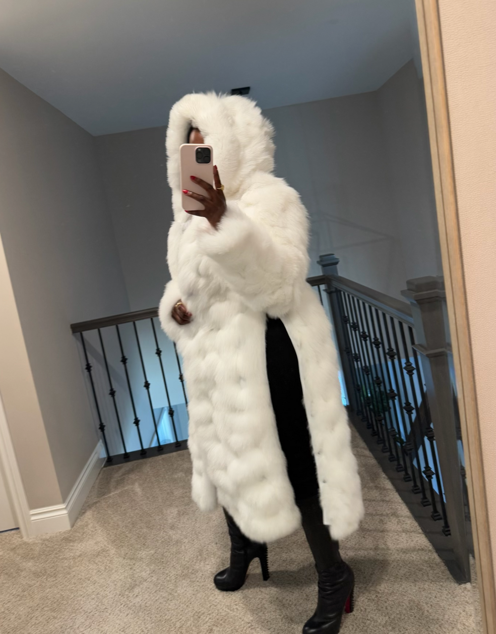 Size L white fur w/ hood and high split (snap closures on side)