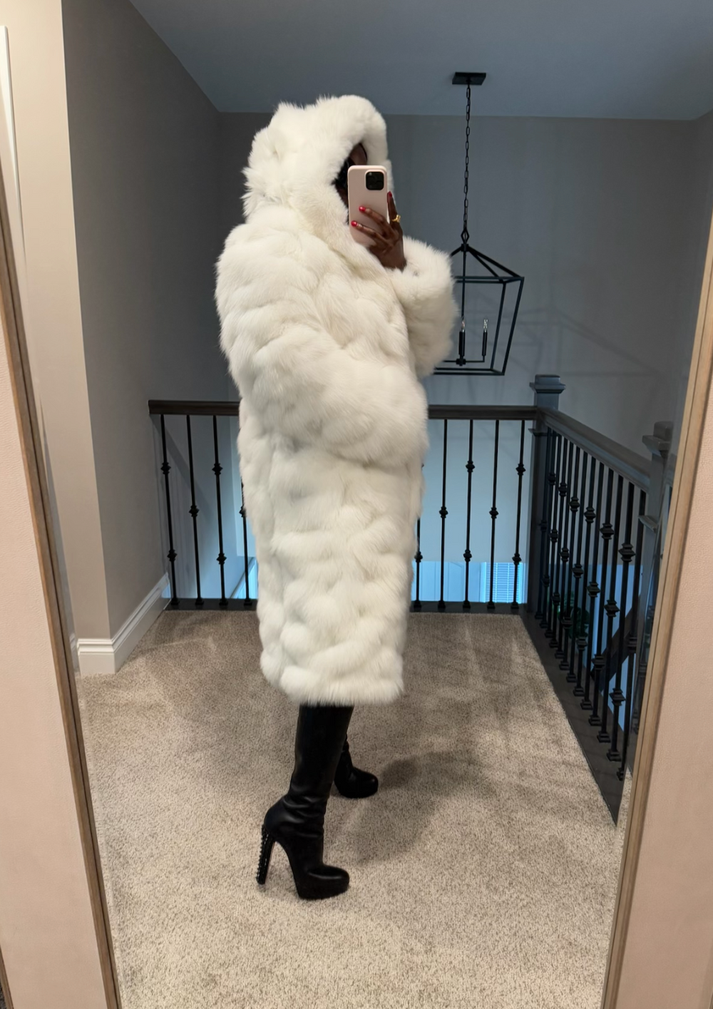 Size L white fur w/ hood and high split (snap closures on side)